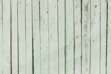 Old wooden background of boards with cracked and peeling paint. Wooden texture