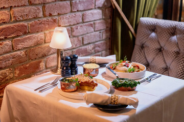 Set for two of seafood for dinner, Grilled shrimps or prawns served with lemon, garlic and sauce