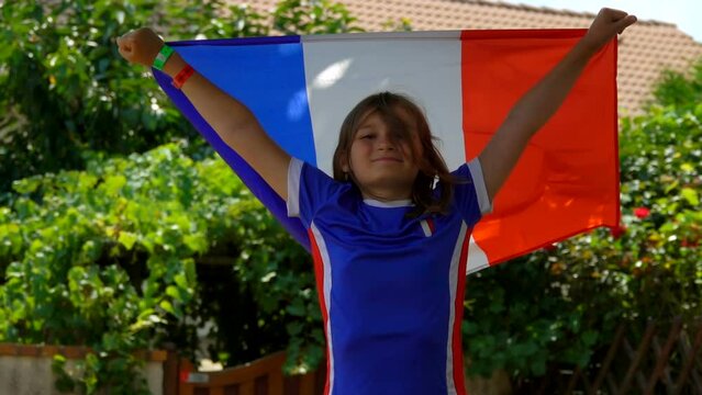 Short-haired girl is a fan of the French national team