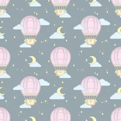 Cercles muraux Montgolfière Kids seamless pattern with funny cartoon stylized hot air balloon, flying at night in the sky, surrounded clouds and stars for textile, wallpaper or wrapping paper