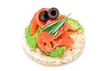 Rice Cake Sandwich with Fresh Salmon, Avocado and Olives - Isolated on White. Easy Breakfast. Diet Food. Quick and Healthy Sandwiches. Crispbread with Tasty Filling. Healthy Dietary Snack - Isolation