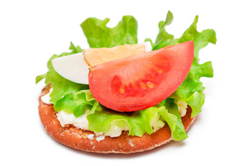 Crispy Cracker Sandwich with Tomato, Lettuce and Egg - Isolated on White. Easy Breakfast. Diet Food. Quick and Healthy Sandwiches. Crispbread with Tasty Filling - Isolation