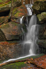 Obraz premium Cerveny creek with Cerveny waterfall in Jizerske mountains in spring morning
