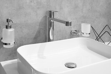 Fototapeta premium Bathroom interior with sink and faucet.