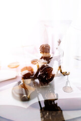 law books and scales of justice on desk in library of law firm. jurisprudence legal education concept.