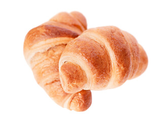 Two french croissants isolated on white background.