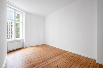 Fototapeta na wymiar white room in empty flat with window and wooden floor