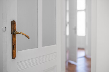 door handle closup in empty apartment room or  vacant flat -