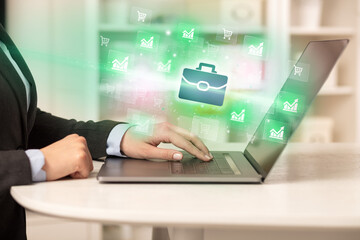 Businessman working on laptop with new business