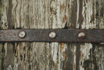 Antique brown wood floor with old iron for conceptual decoration design.	