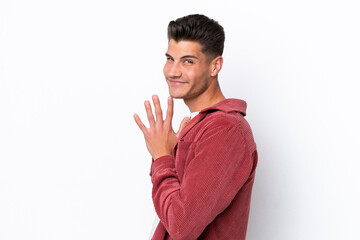 Young caucasian man isolated on white background scheming something