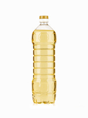 Pure sunflower oil in a plastic bottle on a white background with reflection.