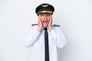 Airplane caucasian pilot isolated on white background with surprise expression