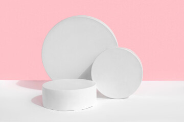 Podium for cosmetic product presentation. Abstract minimal geometrical form. Cylinder stone sphere two forms, shadow. Scene to show products. Showcase, display. Trendy sunlight. Front view. 3D