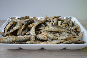 Fried fish Euroropean sprat or sardine, a small and tasty fish caught in the Irish Sea, the Black Sea, the Baltic Sea and the Sea of the Hebrides.