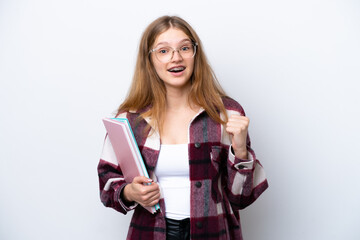 Naklejka premium Teenager student Russian girl isolated on white background celebrating a victory in winner position