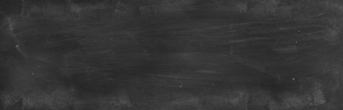 Chalk rubbed out on black board background