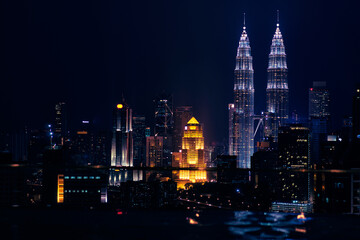 Fototapeta na wymiar Lights of megapolis. Night cityscape. Kuala-Lumpur, Malaysia.