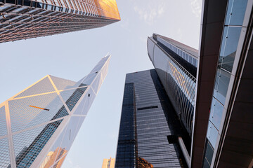 Obraz na płótnie Canvas Modern city architecture. Skyscrapper against blue sky.