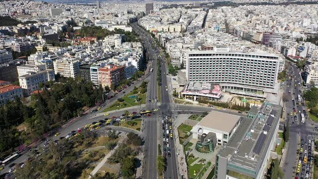 Aerial drone video of famous urban cityscape in Athens centre of Vasilisis Sofias Avenue and Vasileos Konstantinou, Attica, Greece