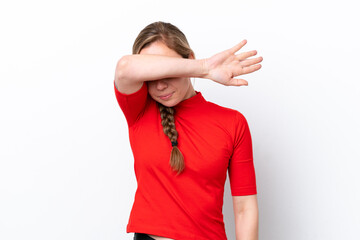 Young caucasian woman isolated on white background covering eyes by hands
