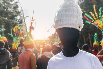 Portrait of a young Latin man dressed in traditional holy week dress during the celebration of a religious parade in Masatepe, Nicaragua, known as the Jewish