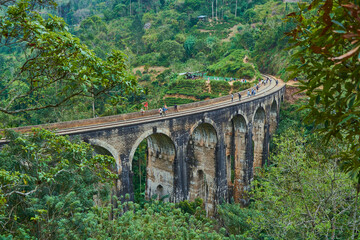 Fototapeta na wymiar nine-arch bridge jungle mountains summer