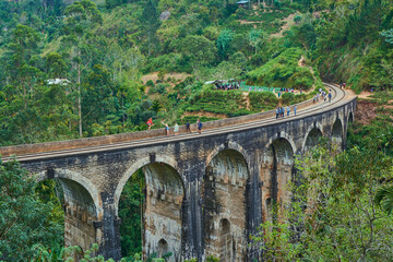 Fototapeta na wymiar nine-arch bridge jungle mountains summer