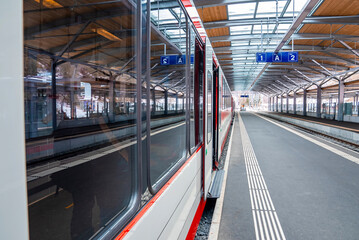 Close-up of train arrived at platform on station during winter