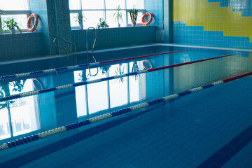 Interior of public swimming pool. empty pool before swimming lessons