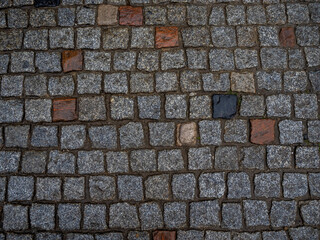 imagen textura suelo de piedras cuadradas de distintos colores 