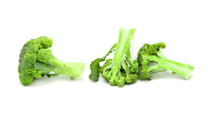 Fresh organic broccoli cabbage whole and two halves isolated on white background.	