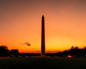 The Washington Monument is an obelisk within the National Mall in Washington, D.C. at sunset.	