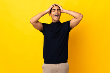 African American man over isolated background laughing