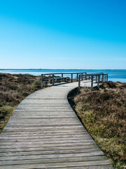 Wooden walkway to a view point at Morsum Cliff on the island Sylt