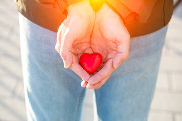 person holding a heart. Red heart concept. Valentine day. 