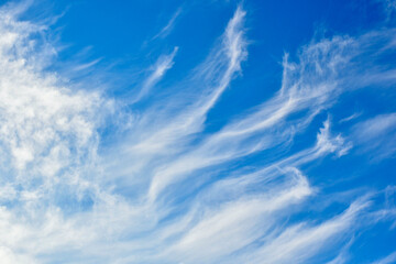 abstract unfolding clouds in the blue sky