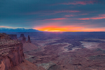 Fototapeta na wymiar Sunrise over Canyonlands National Park near Moab, Utah. The view is right next to Mesa Arch.
