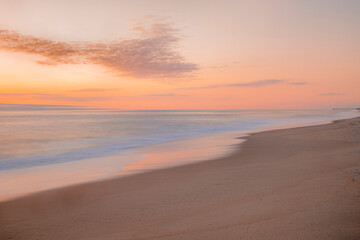 Fototapeta na wymiar Coastal long exposure at dawn. The view is along the Outer Banks of North Carolina near Nags Head.