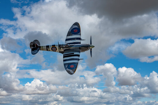 Moose Jaw, Saskatchewan, Canada- July 7, 2019: Closeup of a Supermarine Spitfire Mk IX flying at the Saskatchewan Airshow