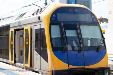 Commuter train approaching Homebush train station Sydney NSW Australia