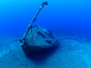 wreck underwater shipwreck on seabed sea floor standing metal on ocean floor scuba divers to see