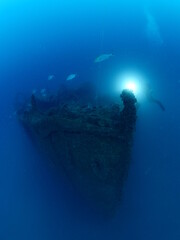Fototapeta na wymiar ship wreck underwater deep sea bottom metal on ocean floor scuba divers to explore