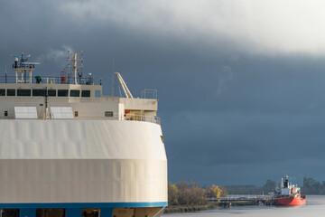 Large car carrier cargo ship. Big Ro-Ro vessel cargo export and import operation.
