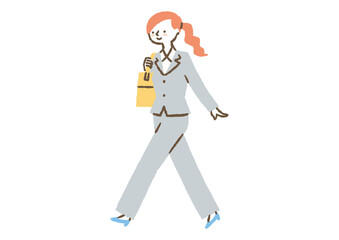 スーツを着て会社に向かう女性社員_色