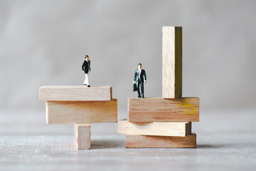 Risk business concept, business man stands on wooden blocks. risk control and managment idea