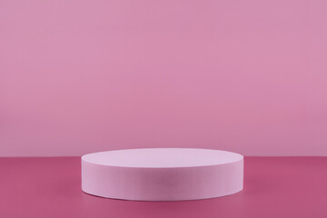 Podium pedestal showcase for cosmetic product presentation, minimal abstract pink background for...