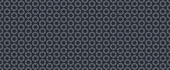 Background pattern with a gray geometric elements on a black background. Seamless background for wallpapers, textures. Vector image.