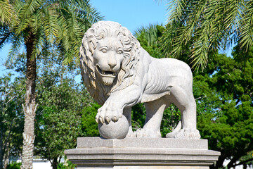Historic stone lion statue at bridge of lions in St Augustine Florida - obrazy, fototapety, plakaty