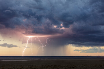 lightning bolt in a storm at sunset